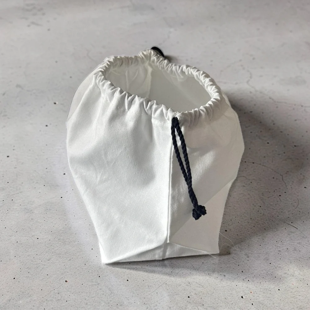 Authentic CHANEL White and Black Drawstring Pouch